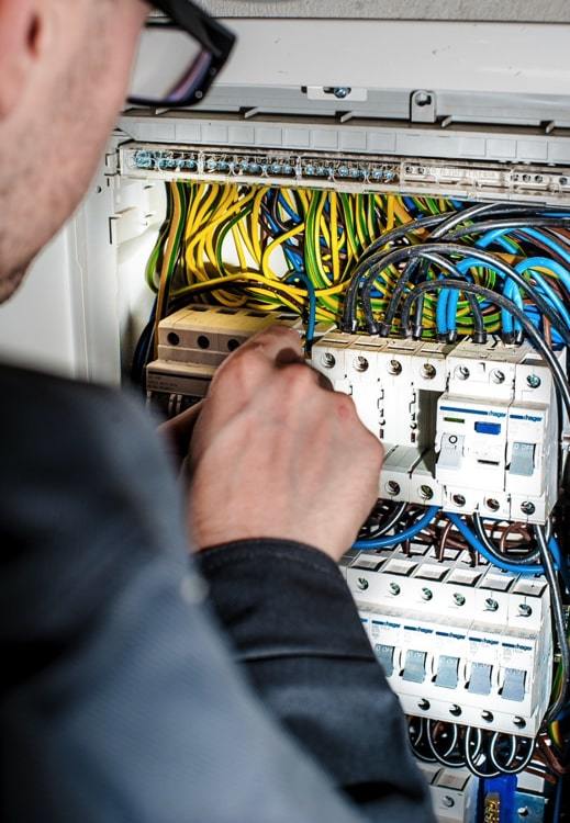 electrician working on consumer unit