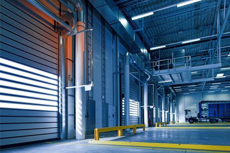 The interior of a commercial warehouse that could benefit from LED lighting